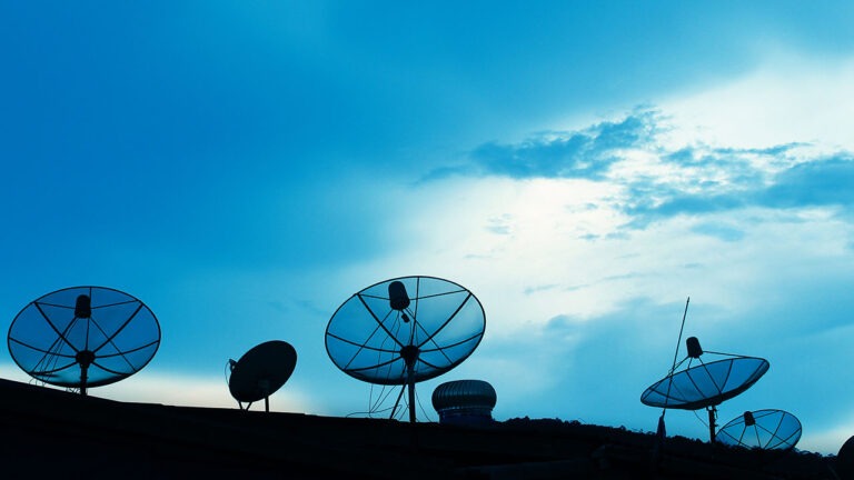 Satellite antennas pointing at the sky - banner for the ETSI Conference on “Non-Terrestrial Networks, a Native Component of 6G"